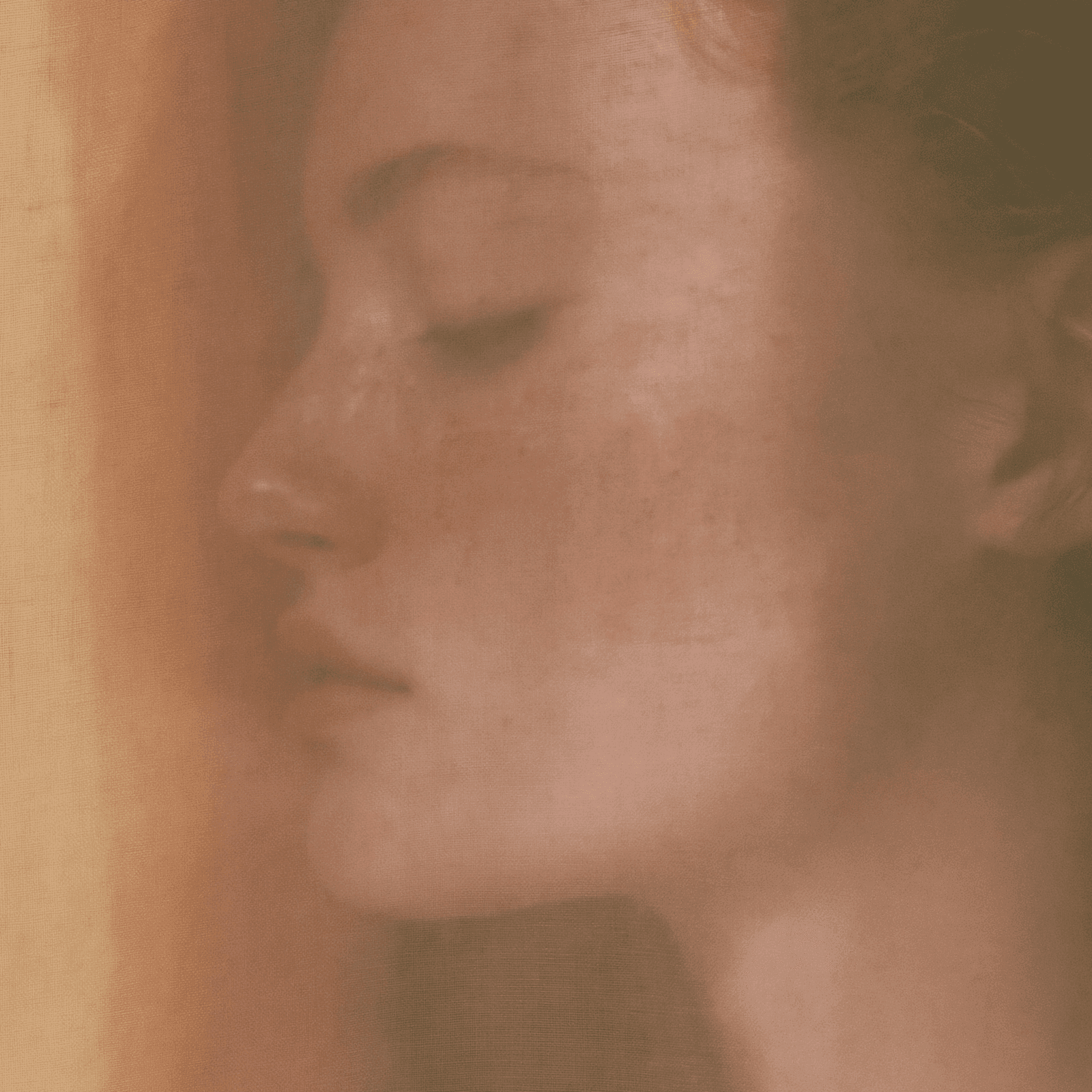 A woman in profile exhaling at an open window, evoking the breath-test methodology for SIBO and IMO
