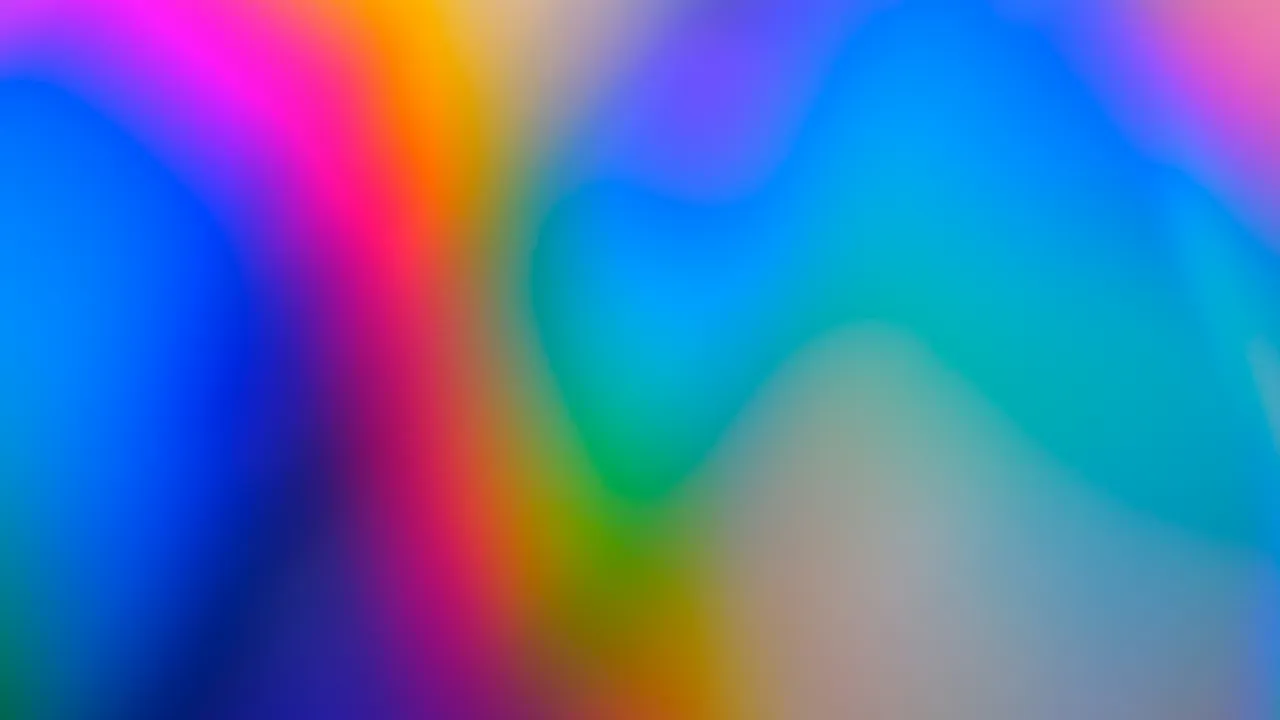 Rainbow light from a holographic surface, flowing in soft bands