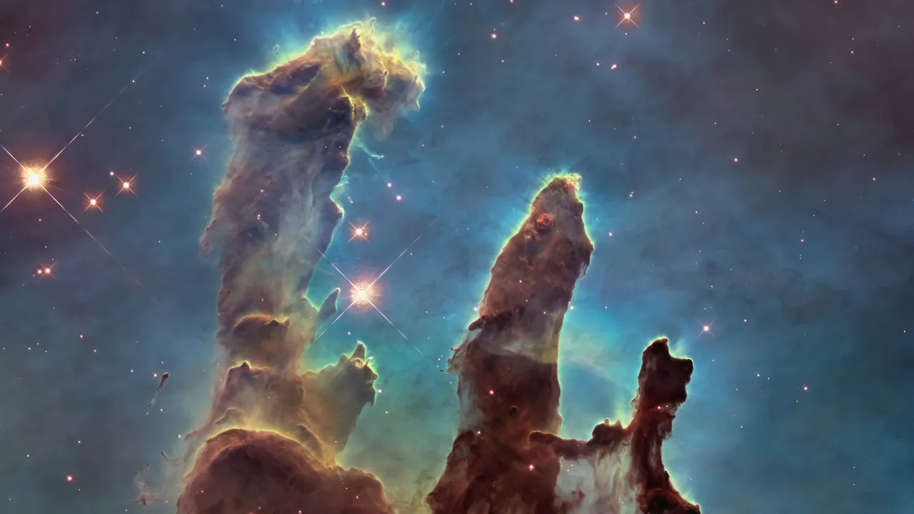 The Pillars of Creation in the Eagle Nebula, photographed by the Hubble Space Telescope